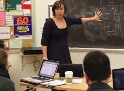 Teacher at board