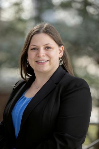 Photo of Sarah Hughes against tree background